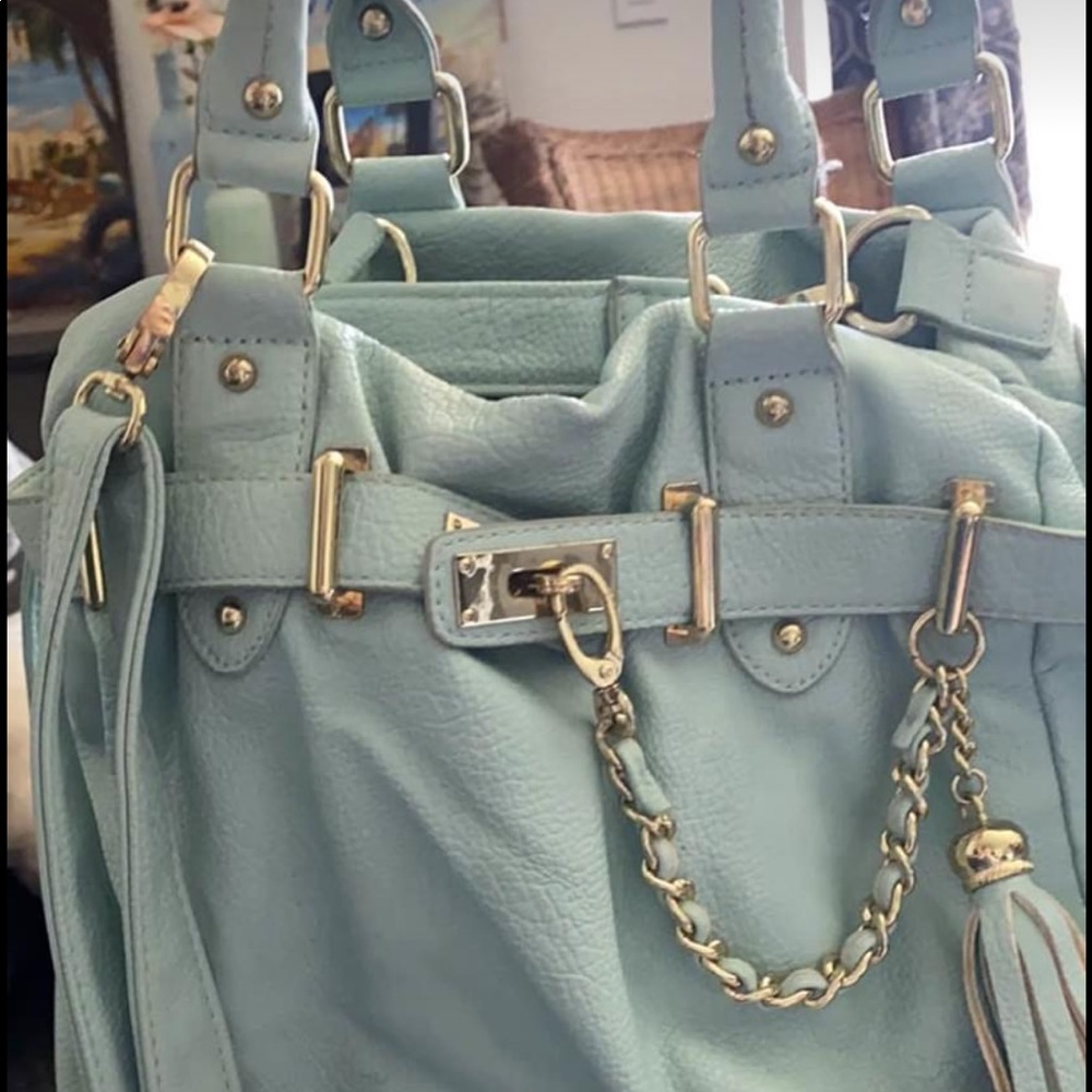 Used Mint colored Steve Madden purse